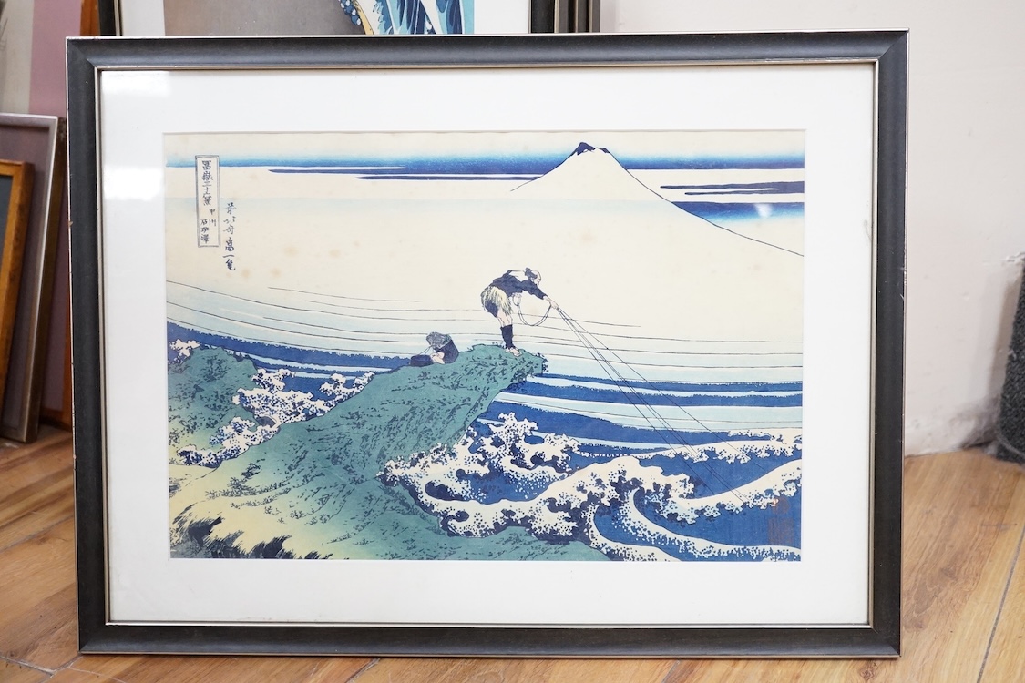 A set of ten Japanese woodblock prints to include ‘Great wave off the coast of Kanagawa’, ‘Fishermen at Kajikazawa’ and ‘Evening shower’, largest 25 x 36cm. Condition - fair